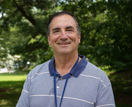 Dr. Peter Basser outside among the trees